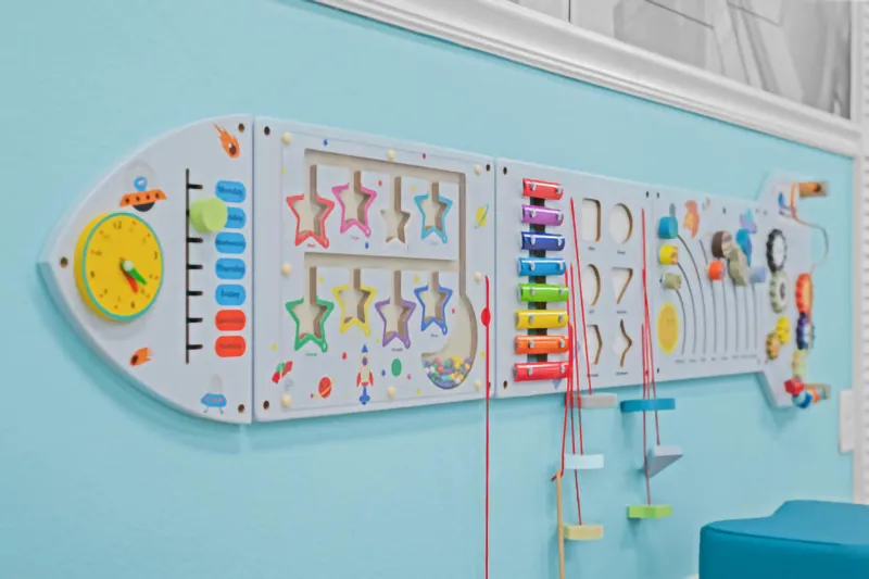 Launchpad Pediatrics waiting room interactive toys