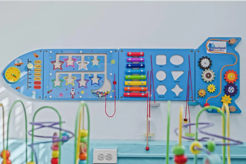 Launchpad Pediatrics waiting room interactive toys